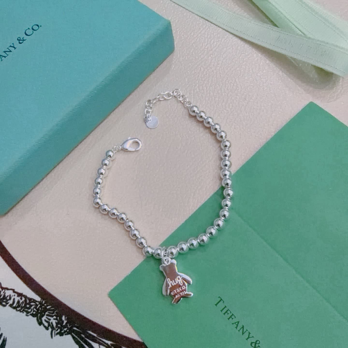 Tiffany & Co. Sterling Silver Beaded Bracelet with Huggy Bear Charm